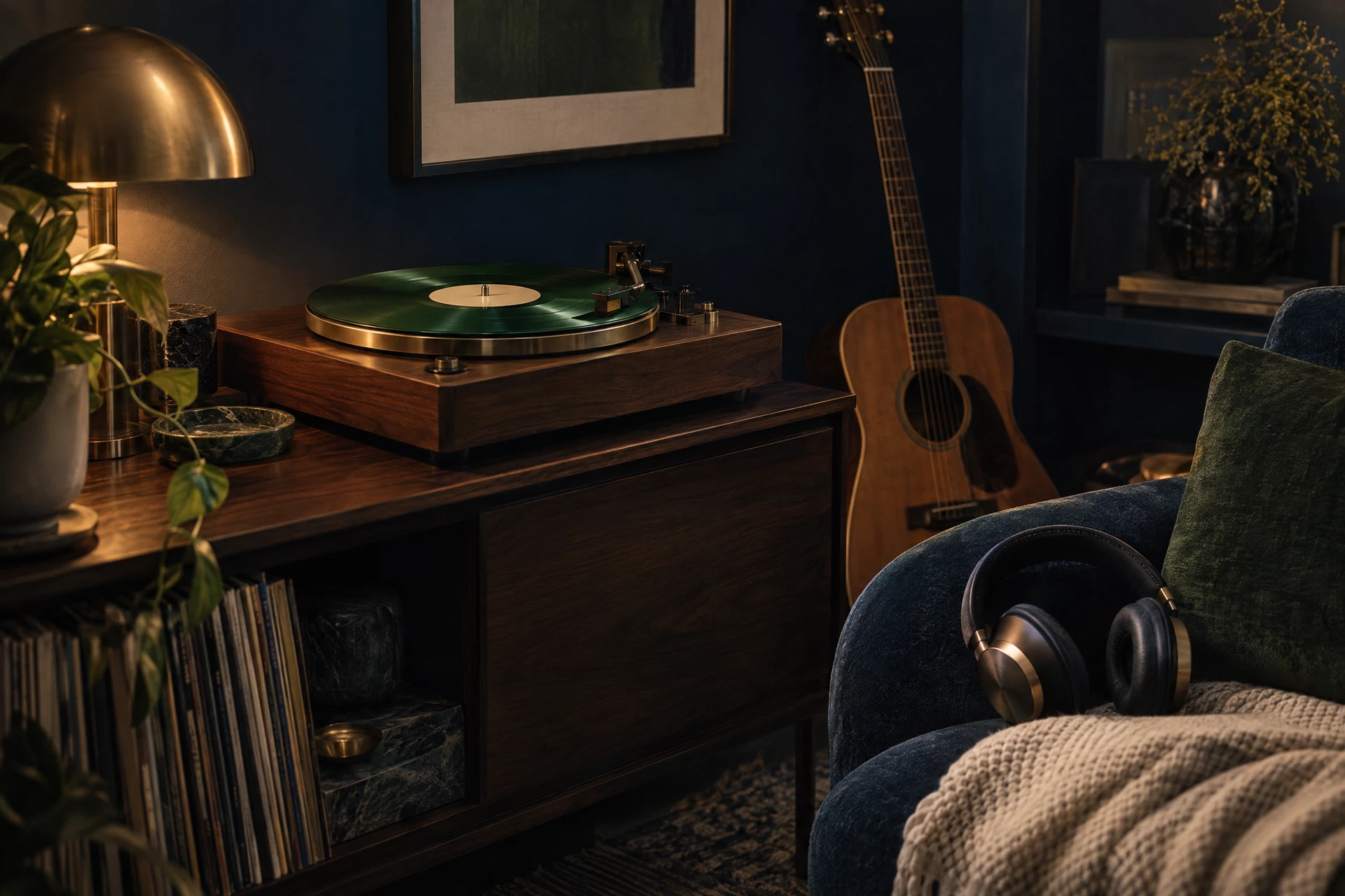 A turntable and guitar in a deep blue listening room